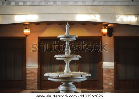 Photo of a water fountain that can be used for mock ups, backgrounds, wedding, invitations cards and designs.
