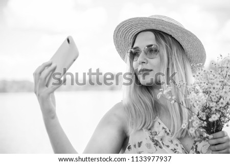 Beautiful plus size woman with telephone take a selfie on vacation and enjoy the moment