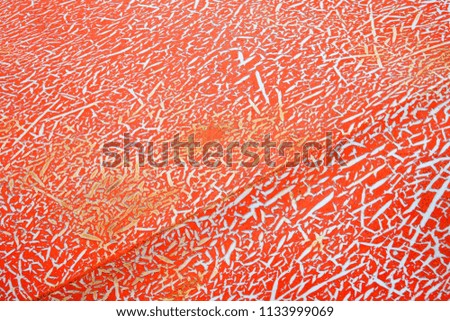 Texture of the old red color car peeling off. Suitable for articles background about vintage or classic car.