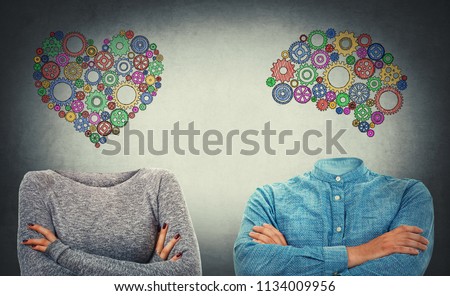 Choose between heart and mind. Incognito man and woman with crossed hands and drawn cog brain and heart symbol instead of head. Human character, emotions and thinking concept. Introvert and extrovert.