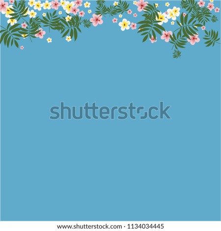 Tropical background with hibiscus flowers and tropical leaves.