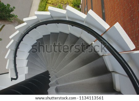 going down the circular stair