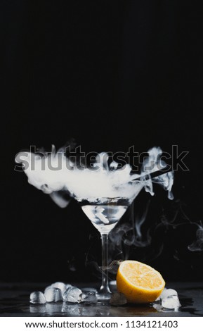 cocktail with splash and ice vapor
