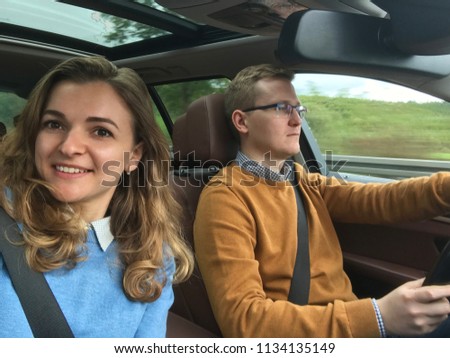 Family happy selfie photo in modern car during vacation
