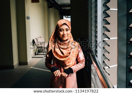 Portraiture of beautiful young Muslim Girl wearing hijab and Casual outfit