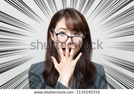 Surprised young asian woman.