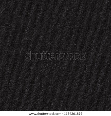 Corrugated paper texture in classic black colour. Seamless square background, tile ready. High resolution photo.