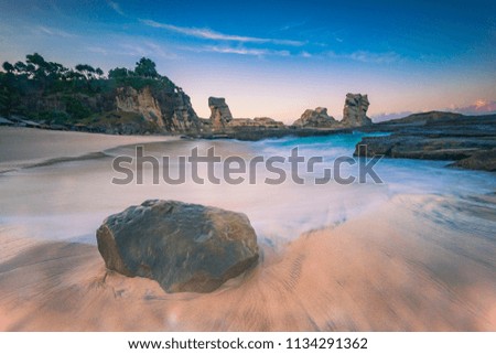 Klayar beach in long exposure shot and golden hours, East Java, Indonesia; May 2018