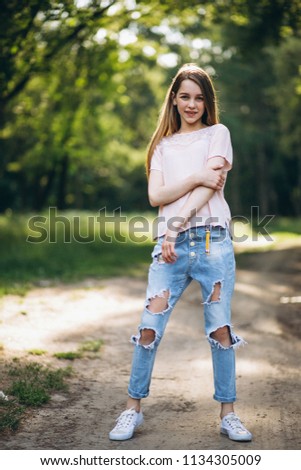 Cute girl camping in forest