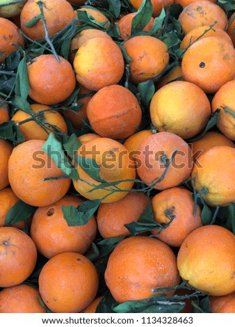 oranges with leaves top view for food textures