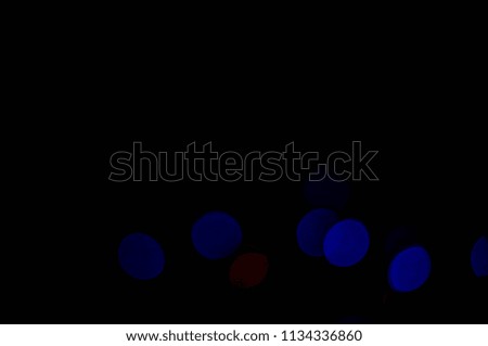 Lights blue and green color on black background. Abstract lights. bokeh effect.Abstract background. Defocus.