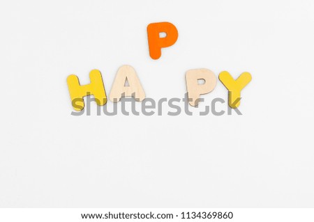 word happy made of colorful letters on white background