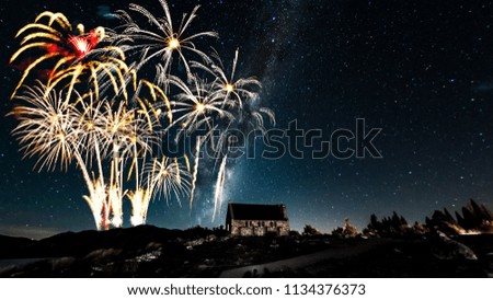 Landscape scenes at night with milky way stars and beautiful fireworks backgrounds for new year and christmas festival concept at tekapo lake south island new zealand