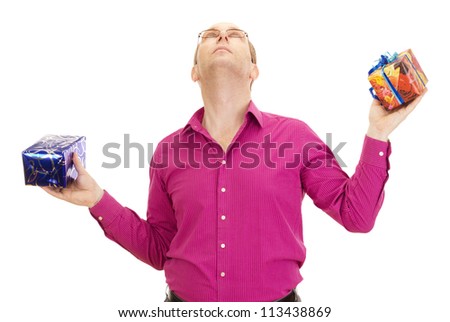 A business person juggling with two colorful gifts