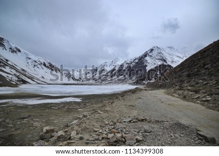 road and sbow mountains in Ladakh India