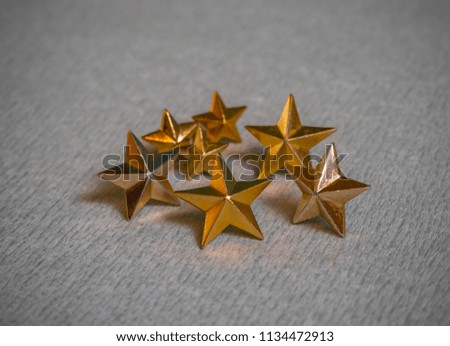 stars of an officer on a gray background