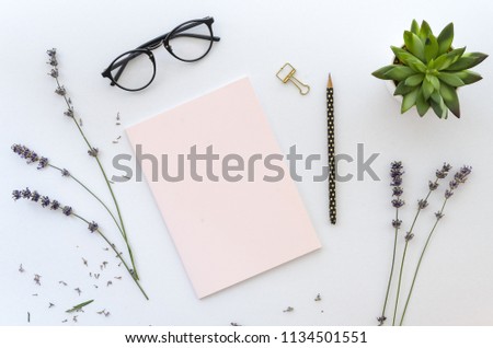 dried lavender around pink note and a black pencil on white background for your lettering. Top view, flat lay mockup
