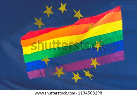 LGBT Rainbow flag blended with European Union Flag, Double Exposure of Rainbow Flag and Blue Flag with Stars, Abstract photography shallow depth of field
