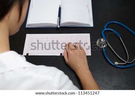 Doctor writing medical records