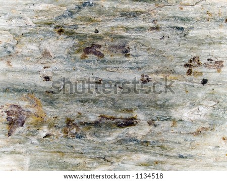Stock macro photo of the texture of rough stone.  Useful for layer masks or abstract backgrounds.