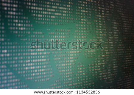 Brain pattern made of binary code on computer screen. The Artificial intelligent age. blue green computer screen with white one and zero number code.