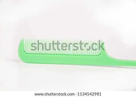 Plastic hair comb isolated in white background.