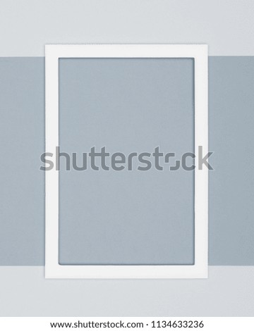 Abstract flat lay pale grey colored paper texture minimalism background. Minimal template with empty picture frame mock up.