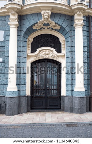 Photo of antique vintage old style forged decorated door