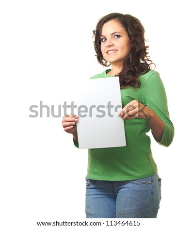 Attractive smiling girl in green shirt holding a poster in hand. Isolated on white background