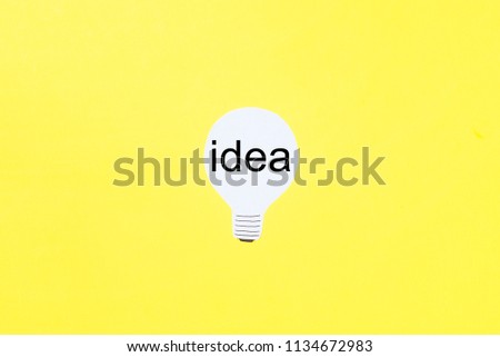 concept idea paper light bulb on trending yellow background, thinking differently, creative business, idea symbol concept, Copy space text, Top view, flat lay