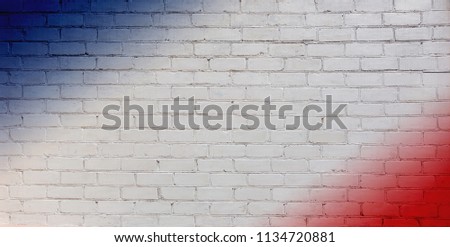 Abstract creative patriotic Background. Art pattern of  White, red and blue colors on Brick Wall Texture. Concept flags of USA and France. Wallpaper or Web banner With free Space for text