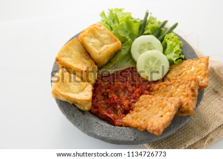 traditional indonesian culinary food. sambal and penyetan tempe tahu