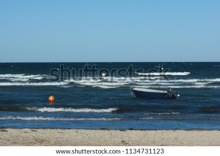 Boat in balkan sea at stormy day in summer in germany