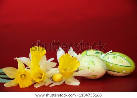Pretty yellow daffodils and Easter eggs. 
