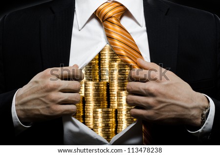 venality businessman or banker  in black costume throw open one's shirt packed heap gold money Royalty-Free Stock Photo #113478238