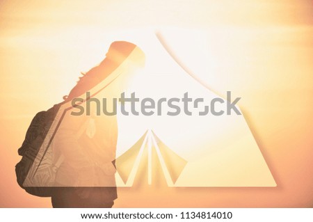 silhouette woman traveler see view sunset on the mountain in moment of happiness with graphic tent icon.feel relax lifestyle.