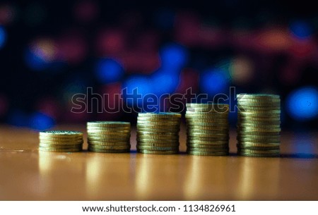 Gold coins stacked.