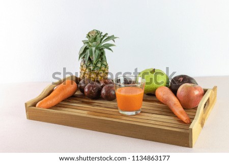 Fresh juice and mix is squeeze from real fruits for serve now on wood tray 