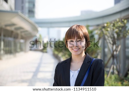 Portrait of a young smiling Japanese woman