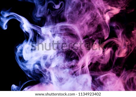 Blue and purple  cloud smoke on black  isolated background