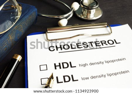 Cholesterol, hdl and ldl. Medical form on a desk. Royalty-Free Stock Photo #1134923900