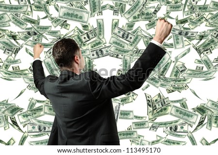 successful businessman and money rain