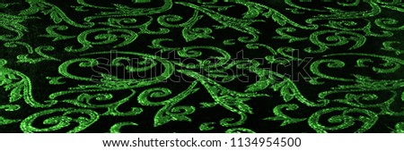  pattern of silk fabric Royal monogram. green. Luminous velvet represents a shining gold floral damask pattern that grows everywhere. This velvet can also be used for a number of fashion applications!