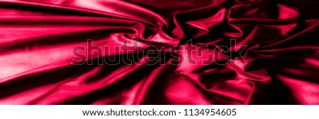 Texture, background, pattern. Dark red silk fabric. Silk satin Fabric  Silk square bridal fabric.