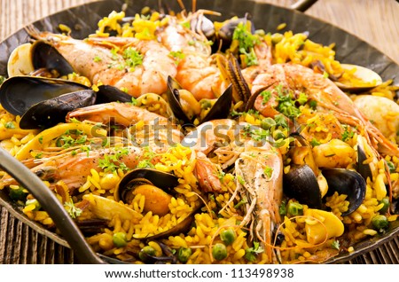 seafood paella in the fry pan Royalty-Free Stock Photo #113498938