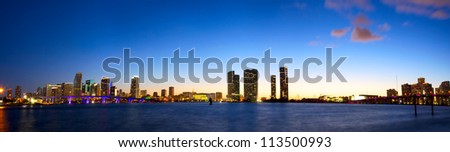 Panoramic view of Miami skyline and Biscayne Bay at dusk