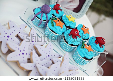 Treats at a birthday party of a child, designed as sea animals