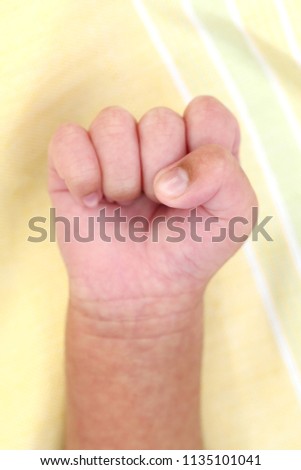 Close up of newborn fist