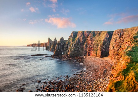Sunrise at Stacks of Duncansby, Duncansby Head, John o' Groats,Caithness, Scotland, UK Royalty-Free Stock Photo #1135123184