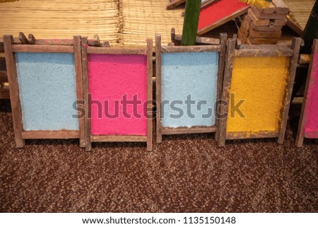 Colorful texture paper on wooden frame for artwork or decoration